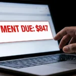 MOHELA IDR pending with payment due amount shown on laptop screen